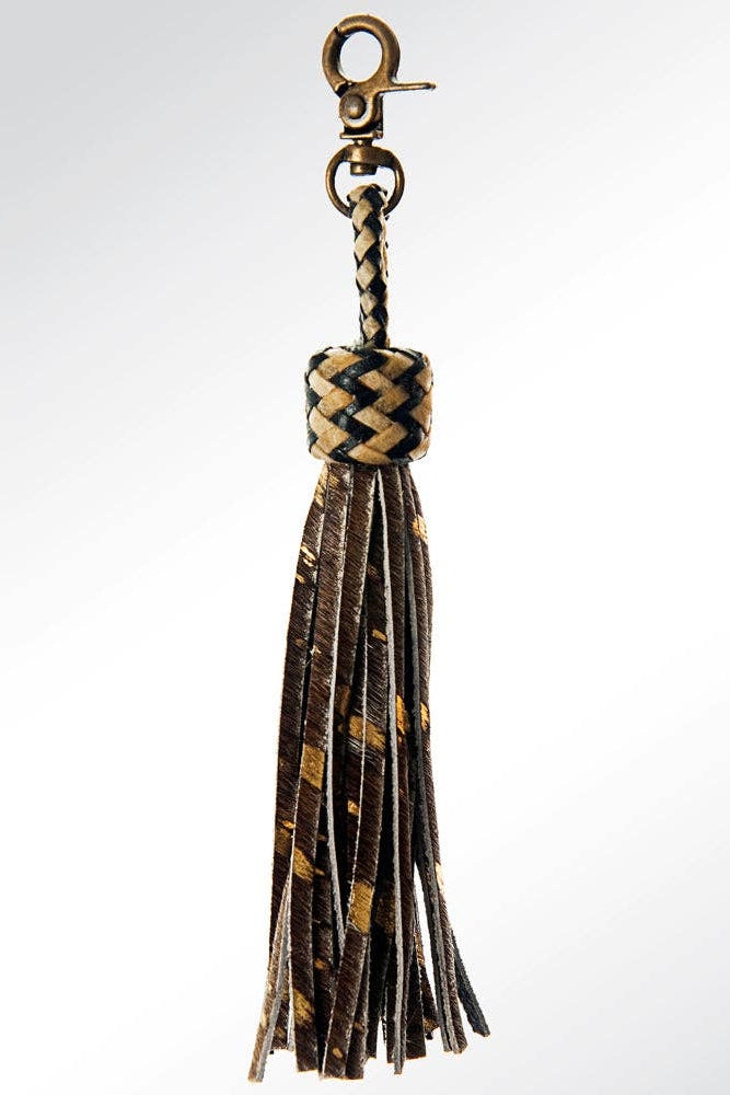 Tassel keychain with braided design on a white background
