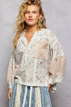 Load image into Gallery viewer, WOMAN WEARING LACE BLOUSE GREY BACKGROUND