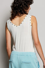 Load image into Gallery viewer, WOMAN WEARING WHITE TANK TOP WITH GREY BACKGROUND