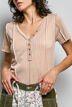 Load image into Gallery viewer, Woman wearing a beige ribbed top with floral and plaid pants against a plain background