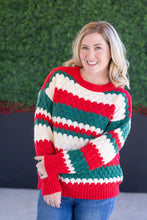 Load image into Gallery viewer, Woman wearing red green and white christmas sweater with a green ivy background