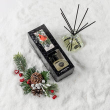 Load image into Gallery viewer, Diffuser set with decorative elements on a snowy background