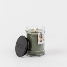 Load image into Gallery viewer, Scented candle with a label on a white background