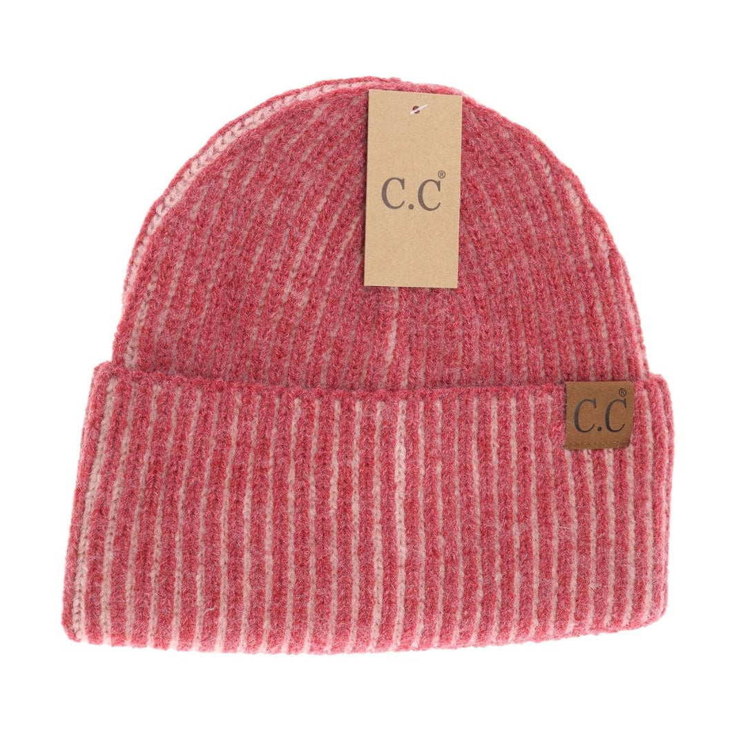 Red beanie with 'C.C' label on a white background