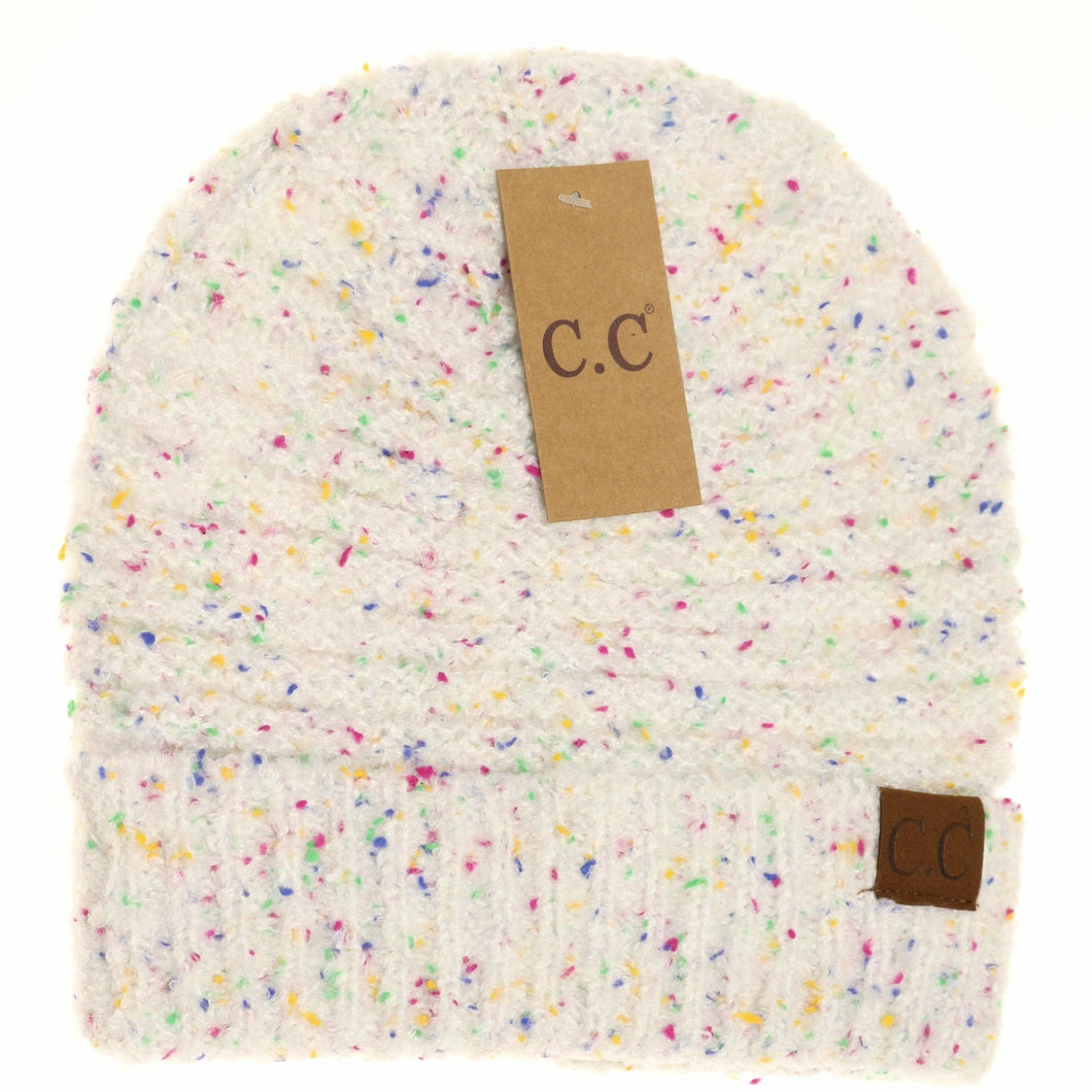 Colorful textured beanie with a brown tag displaying 'C.C' on a white background