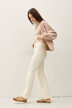 Load image into Gallery viewer, Woman wearing a pink sweater and white pants against a plain background