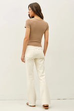 Load image into Gallery viewer, woman wearing taupe top with white background