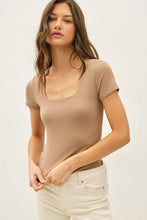 Load image into Gallery viewer, woman wearing taupe top with white background