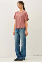 Load image into Gallery viewer, Woman wearing a pink t-shirt and blue jeans on a white background