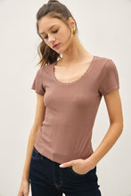 Load image into Gallery viewer, Woman wearing a brown ribbed t-shirt against a plain background