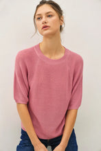 Load image into Gallery viewer, Woman wearing a pink sweater against a plain background