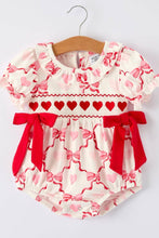 Load image into Gallery viewer, Baby romper with floral pattern and red accents on a white background