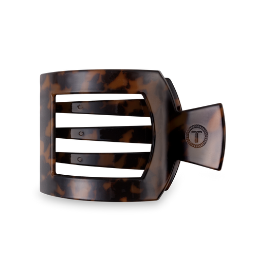 Tortoiseshell hair clip on a white background