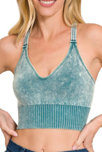 Load image into Gallery viewer, Woman wearing a teal sports bra with a white background