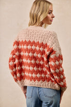 Load image into Gallery viewer, Person wearing a patterned sweater with a neutral background