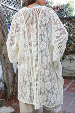 Load image into Gallery viewer, Woman wearing a white lace kimono in an outdoor setting