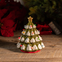 Load image into Gallery viewer, Decorative Christmas tree candle with lights on a wooden surface