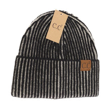 Load image into Gallery viewer, Black and white striped beanie with &#39;C.C&#39; label on a white background