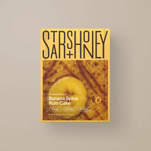Load image into Gallery viewer, Strshoney collagen protein bar packaging for Banana Spice Rum Cake flavor on a beige background
