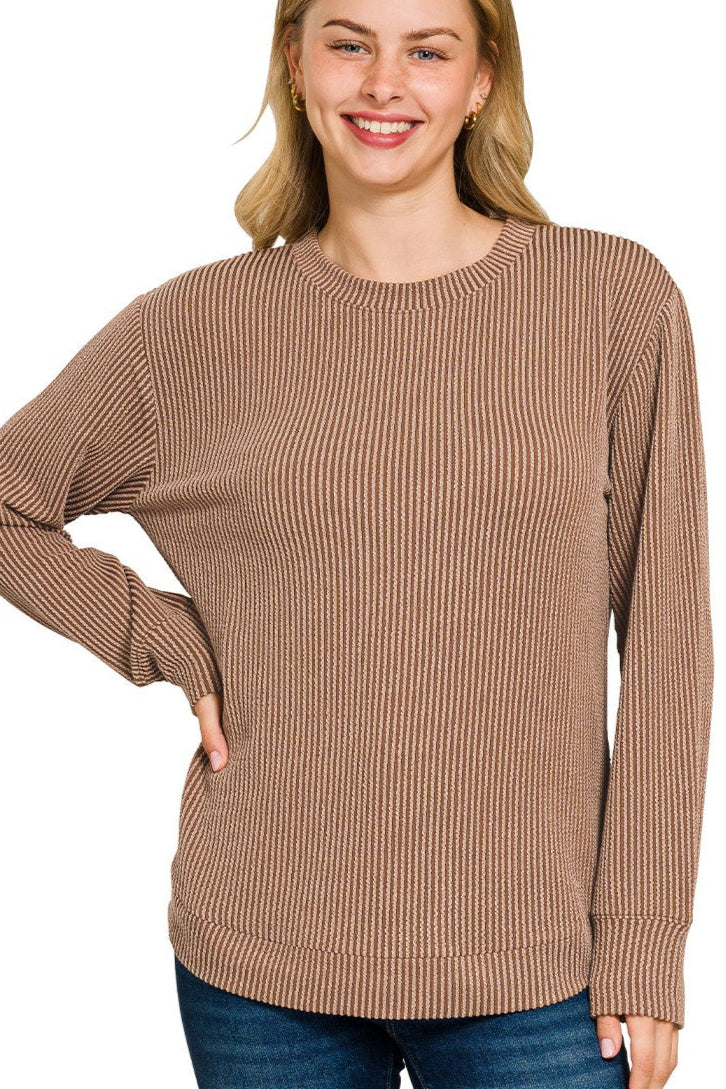 woman wearing brown ribbed long sleeve top