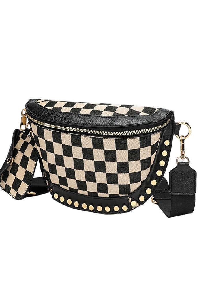 Black and white checkered bag with studded details on a white background