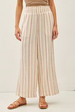 Load image into Gallery viewer, Person wearing light pink striped pants on a white background