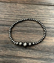 Load image into Gallery viewer, Beaded bracelet on a wooden surface