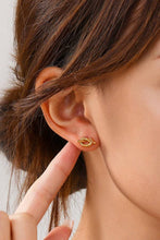 Load image into Gallery viewer, Gold earring worn by a person with brown hair, pointing to the earring.