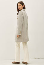 Load image into Gallery viewer, Woman wearing a light gray coat and white pants on a white background