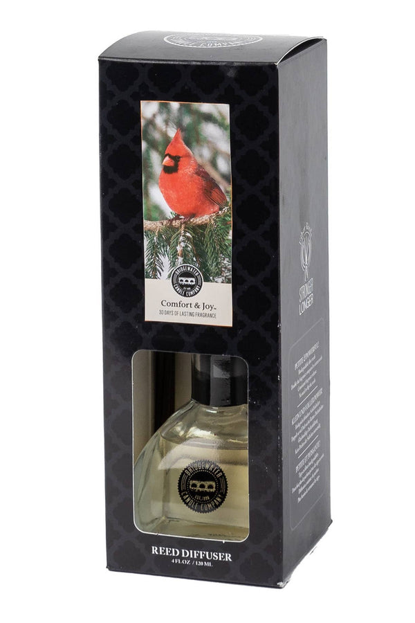 Reed diffuser in a black box with a red cardinal on the label