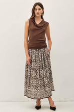 Load image into Gallery viewer, Woman wearing a brown sleeveless top and patterned skirt on a white background