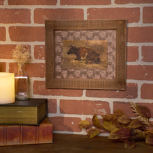 Load image into Gallery viewer, Framed artwork of a cow on a brick wall with decorative elements.