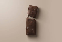 Load image into Gallery viewer, Two chocolate bars on a beige background