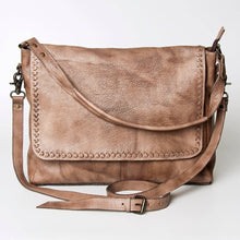 Load image into Gallery viewer, Brown leather bag with studded details on a white background