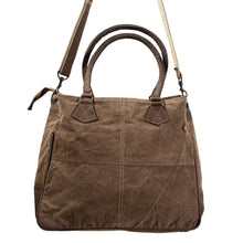 Load image into Gallery viewer, Brown leather handbag with shoulder strap on a white background