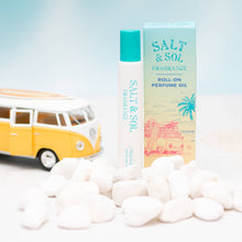 Load image into Gallery viewer, Salt &amp; Sol roll-on perfume oil with packaging and a toy van on a light background