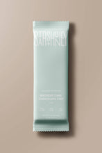 Load image into Gallery viewer, Mint green protein bar with 'Satisfy' branding on a beige background