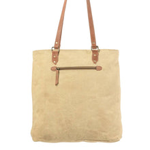 Load image into Gallery viewer, Beige tote bag with brown leather straps on a white background