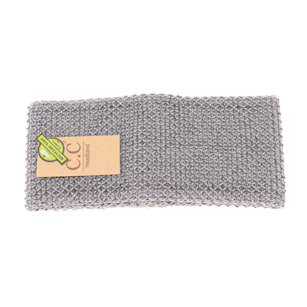Gray textured headband with a beige label on a white background