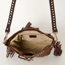Load image into Gallery viewer, Brown leather handbag with studded details on a white background