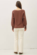 Load image into Gallery viewer, Woman wearing a brown ribbed sweater and white pants on a plain background