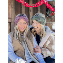 Load image into Gallery viewer, Two women wearing knitted headbands in a snowy outdoor setting.