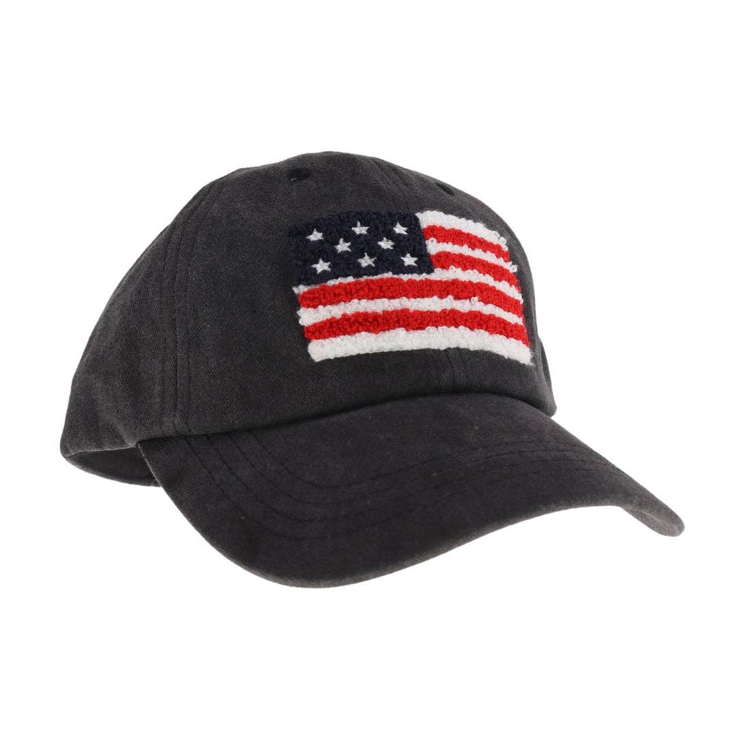 Black cap with American flag patch on a white background