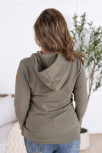 Load image into Gallery viewer, woman with brown hair wearing olive green halfzip hoodie back detail