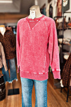 Load image into Gallery viewer, A red Halo Snow Washed Pullover displayed on a mannequin, featuring a round-neck, long-sleeved design with a front pocket.