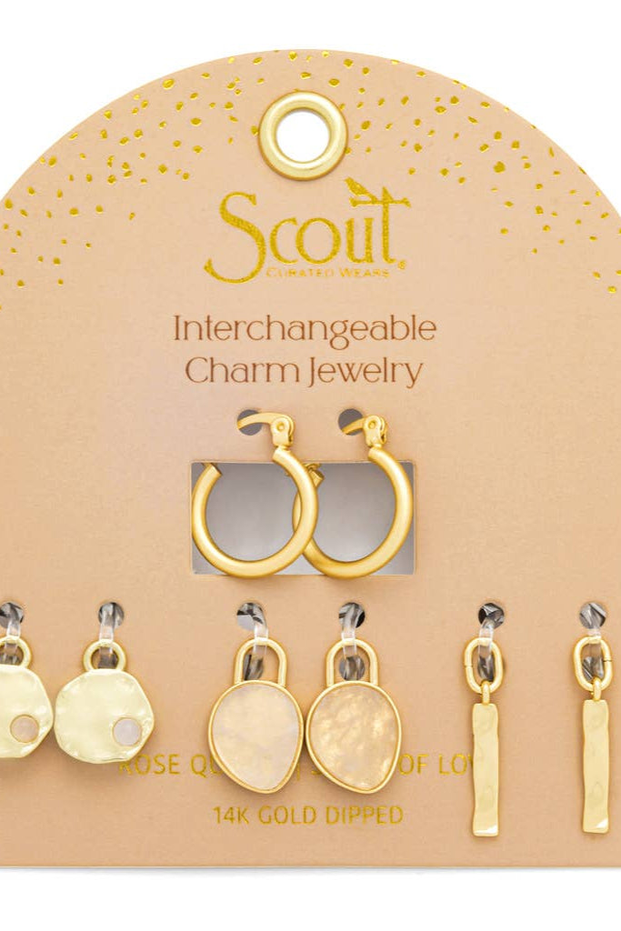 Gold interchangeable charm jewelry set on a Scout branded card