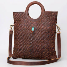 Load image into Gallery viewer, Brown woven handbag with a turquoise stone on a white background