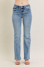 Load image into Gallery viewer, Light blue jeans on a beige background