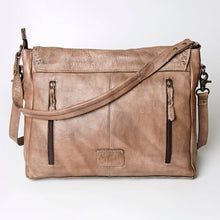 Load image into Gallery viewer, Brown leather bag with visible brand name on a white background