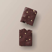Load image into Gallery viewer, Two dark chocolate bars with gold chips on a beige background